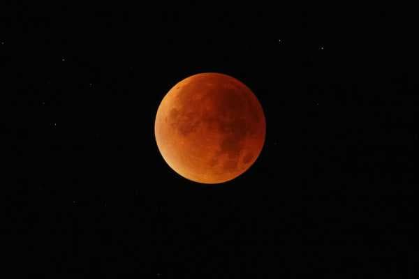 A lunar eclipse is coming. Here’s how to watch the moon turn blood red in the sky.