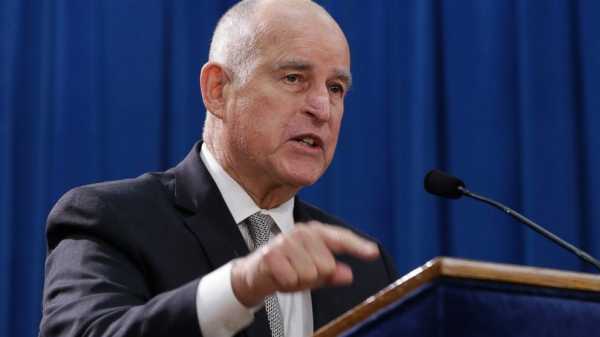California sues over plan to scrap car emission standards