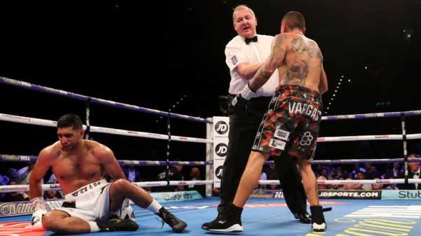 Khan vs Vargas: Amir Khan climbs off canvas to beat Samuel Vargas