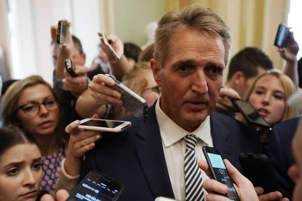 Sen. Jeff Flake announces he plans to vote yes on Kavanaugh