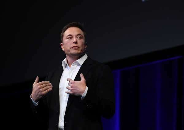 Elon Musk: "Tesla cannot die." His fans agree.