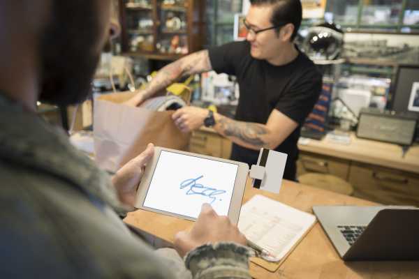 Credit card signatures are ‘becoming extinct.’ So why do you still have to sign all the time?