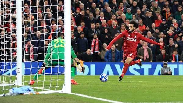 Mo Salah sends Liverpool into Champions League knockout stages