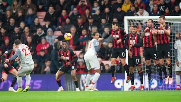 Salah hat-trick sends Reds top, for now