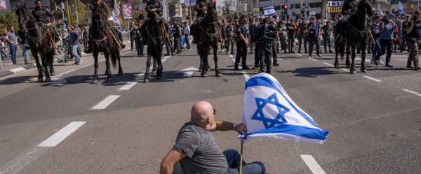 AP PHOTOS: Huge protests erupt in Israel over court reforms