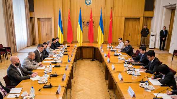 Ukraine’s foreign minister and visiting Chinese envoy discuss peace, but next steps unclear
