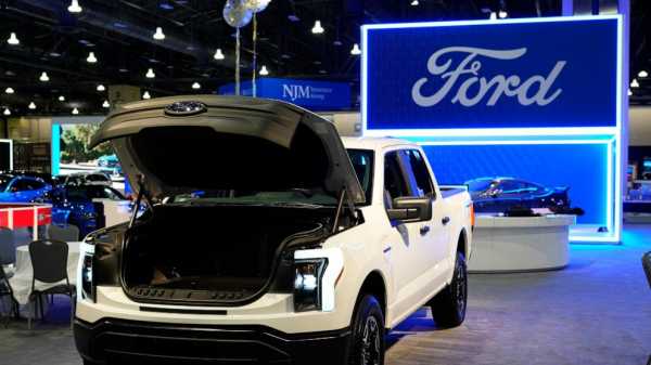 Ford cutting several hundred white-collar jobs to reduce cost amid transition to electric vehicles