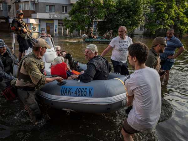 Rescuers are braving snipers as they rush to ferry Ukrainians from Russia-occupied flood zones