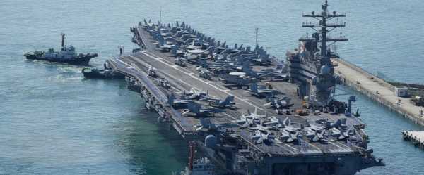 A US aircraft carrier will make a rare Vietnam port call as countries compete for favor in SE Asia
