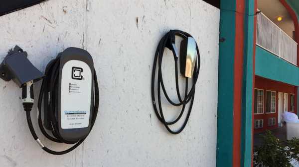 Major automakers unite to build electric vehicle charging network they say will rival Tesla’s