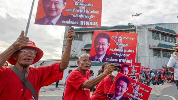 Divisive Thai ex-Prime Minister Thaksin returns from exile as party seeks to form new government