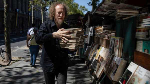 Paris booksellers won’t let their street stands along the Seine be removed for the 2024 Olympics