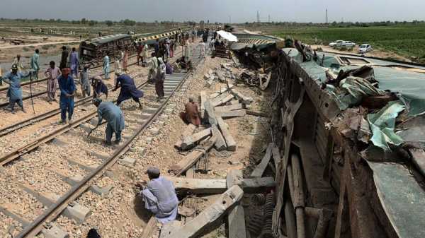 Engineers partially restore rail service after train derailed in southern Pakistan, killing 30