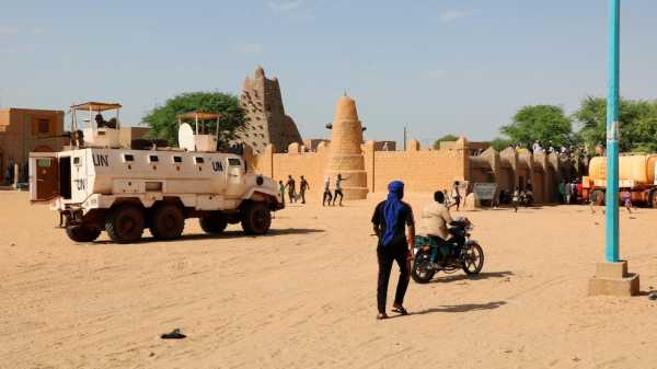 Al-Qaida-linked insurgents in Mali kill 49 civilians and 15 soldiers in attacks, military says