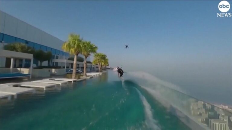 Video Wakeskater plunges from hotel pool to beach in epic Dubai stunt