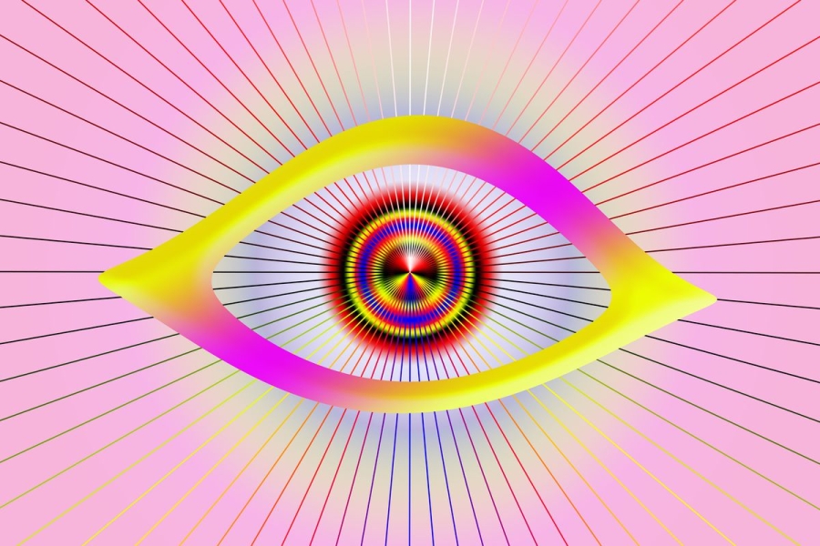 A multicolored illustration of an eye with a patterned pupil and rays emitting from it. 