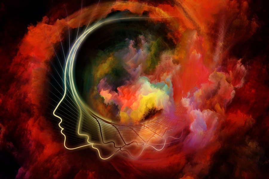 Illustration of a head in silhouette with a colorful nebula in its brain and around it.