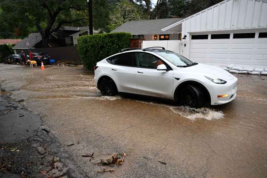 A view of muddy and flooded road in the Beverly Crest neighborhood, as atmospheric river storms hit Los Angeles on February 5, 2024.