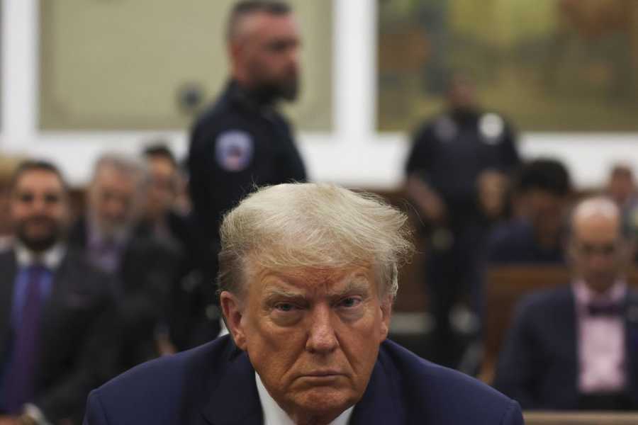 Donald Trump’s face is in focus in a courtroom during his fraud trial.