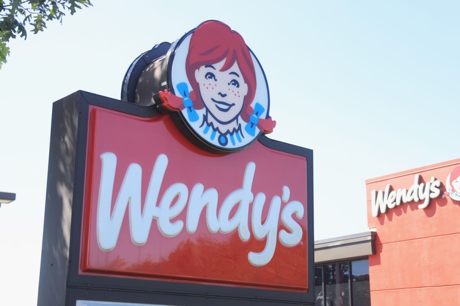 The photo shows a Wendy’s sign and logo outside one of its restaurant locations in New York state.