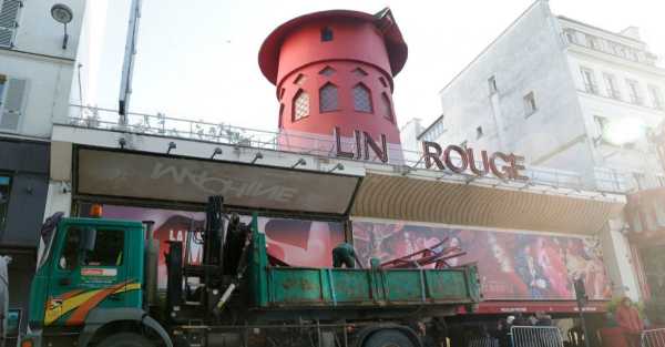Moulin Rouge windmill sails fall onto street below famous Paris cabaret club