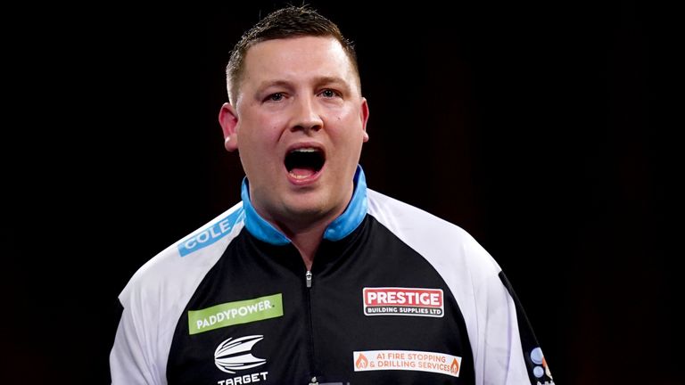 Chris Dobey wins Players Championship 7 on day of nine-dart finishes in Leicester