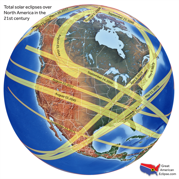 A globe showing the paths of all solar eclipses of the 21st century.