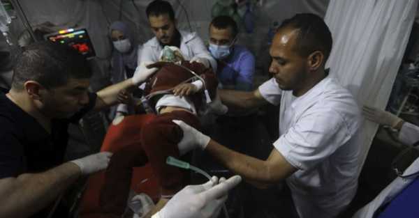 Six children among nine Palestinians killed by Israeli air strike in Rafah