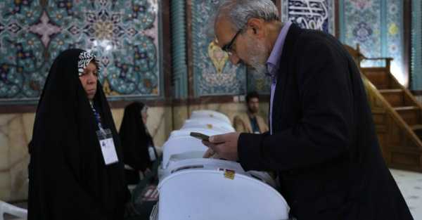Parliamentary election runoff puts hard-liners in charge in Iran