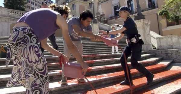 Activists pour paint down Rome’s Spanish Steps in outrage over femicide in Italy