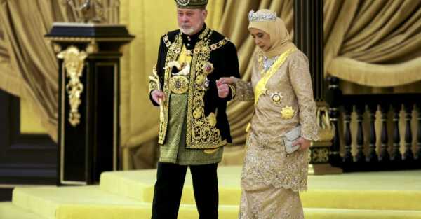 Malaysia honours new king in coronation marked by pomp and cannon fire