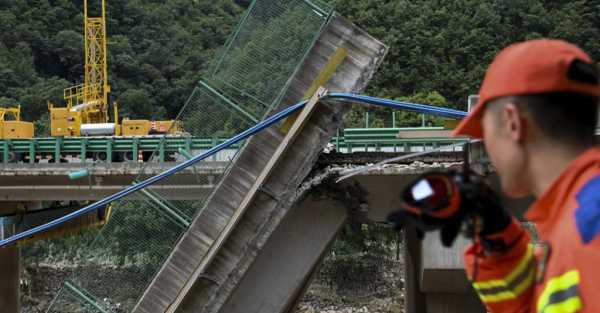 Death toll from China bridge collapse raised to 38 as two dozen still missing
