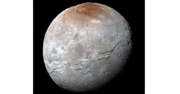 Nasa detects traces of carbon dioxide on surface of Pluto’s largest moon