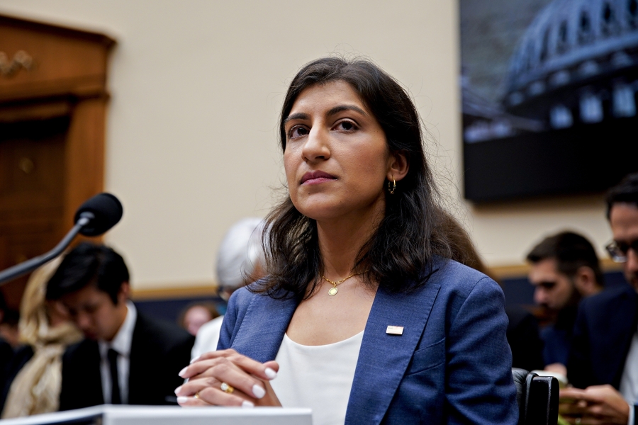 A photo of Lina Khan in a court room