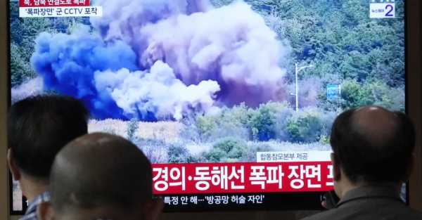 North Korea blows up parts of inter-Korean roads in symbolic display of anger