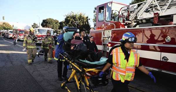 Two people killed as small plane crashes into warehouse