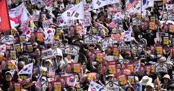 Huge Crowds Protest for and Against South Korean President's Impeachment