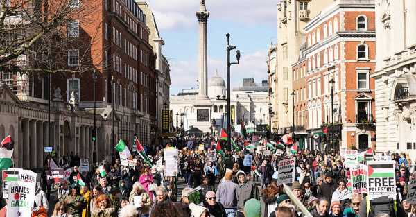 Palestine supporters march through central London