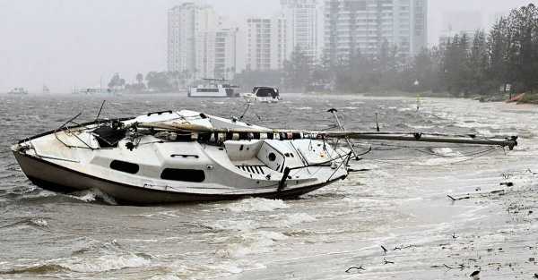 One person missing as tropical cyclone moves west across Australia's east coast