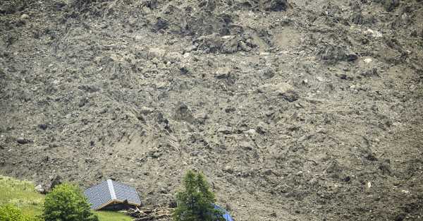 A landslide has hit a Swiss Alpine village that was evacuated days earlier.
