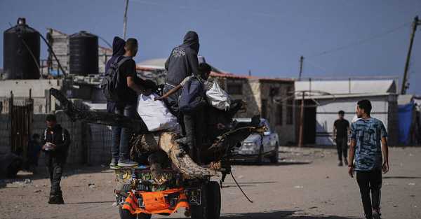 Palestinians claim 12 killed in Israeli shelling near aid stations