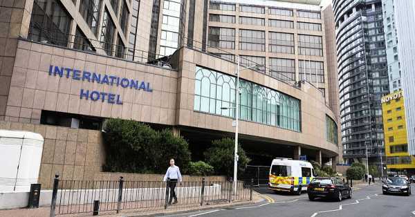 Police arrest six people during protest against refugee hotel in London