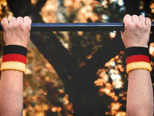What will happen if you hang on the horizontal bar for a minute every day?