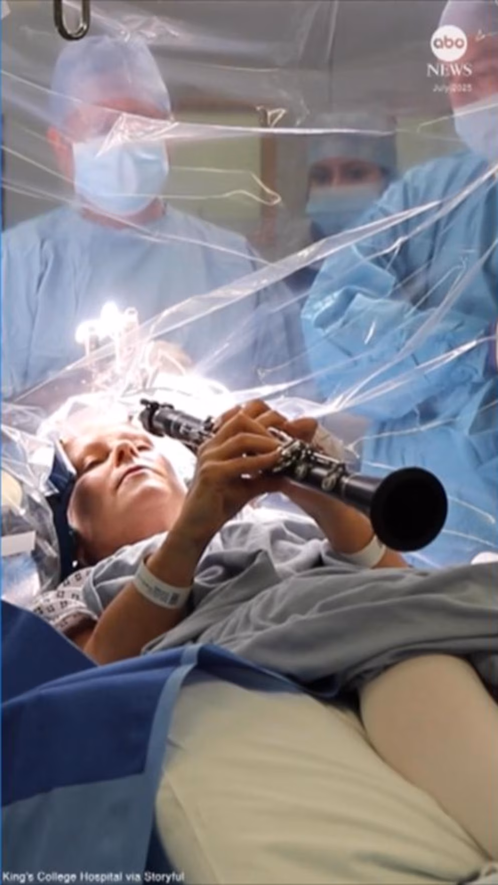 Parkinson’s sufferer toots clarinet as surgeons operate.