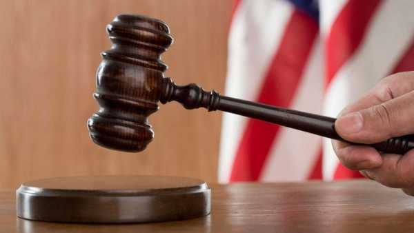 Ex-immigration judges take legal action against Trump team after dismissal.