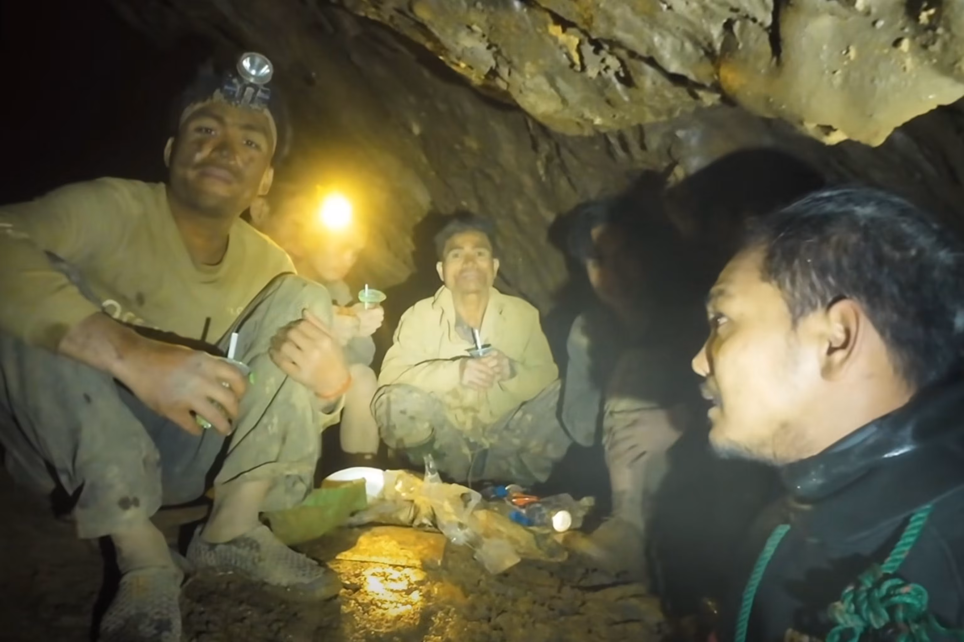 More divers reach Laos to explore narrow caverns in urgent search for 2 locals. 5 More divers reach Laos to explore narrow caverns in urgent search for 2 locals. 5