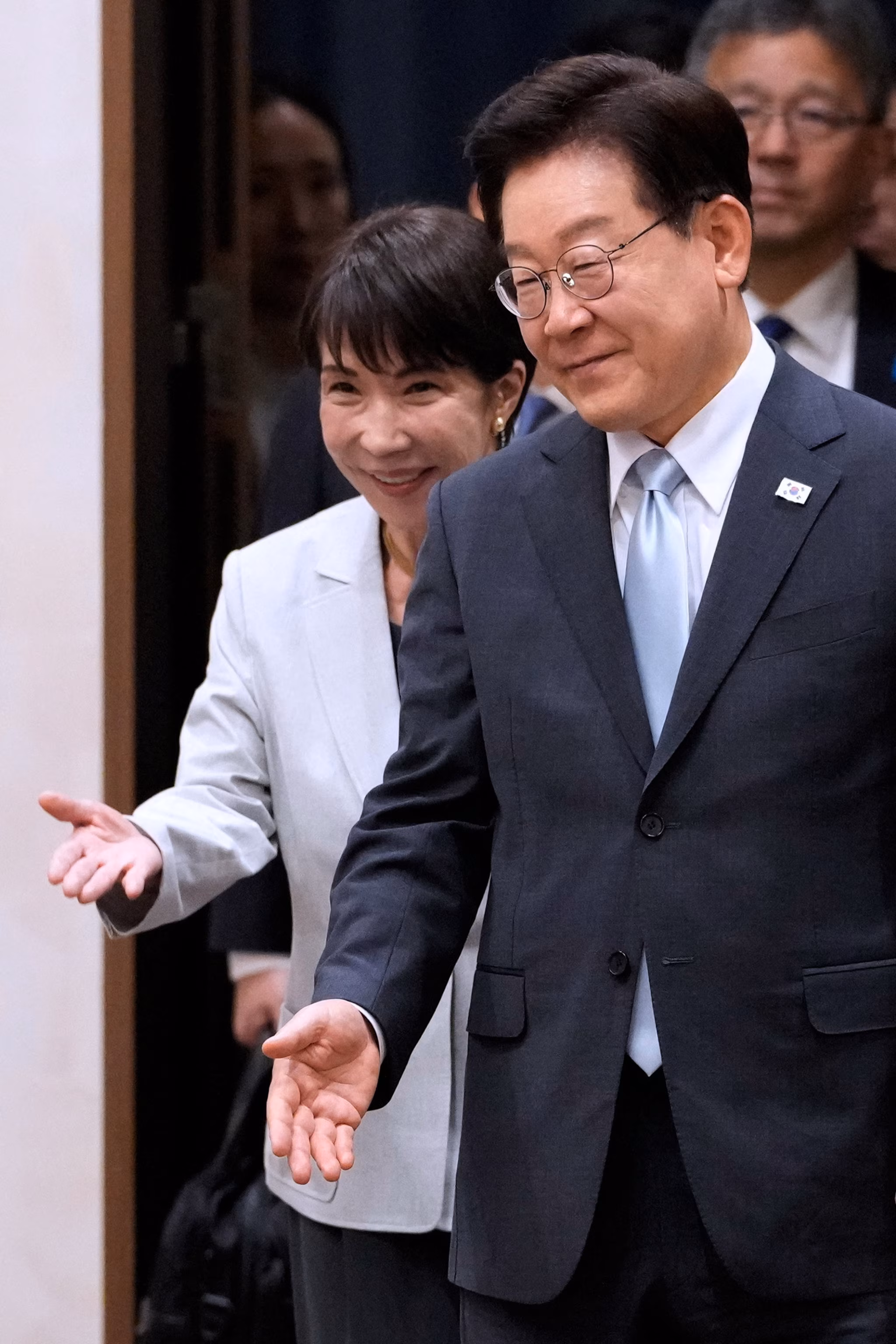 A year into his term, South Korea's Lee garners significant backing, yet a legal cloud lingers. 4