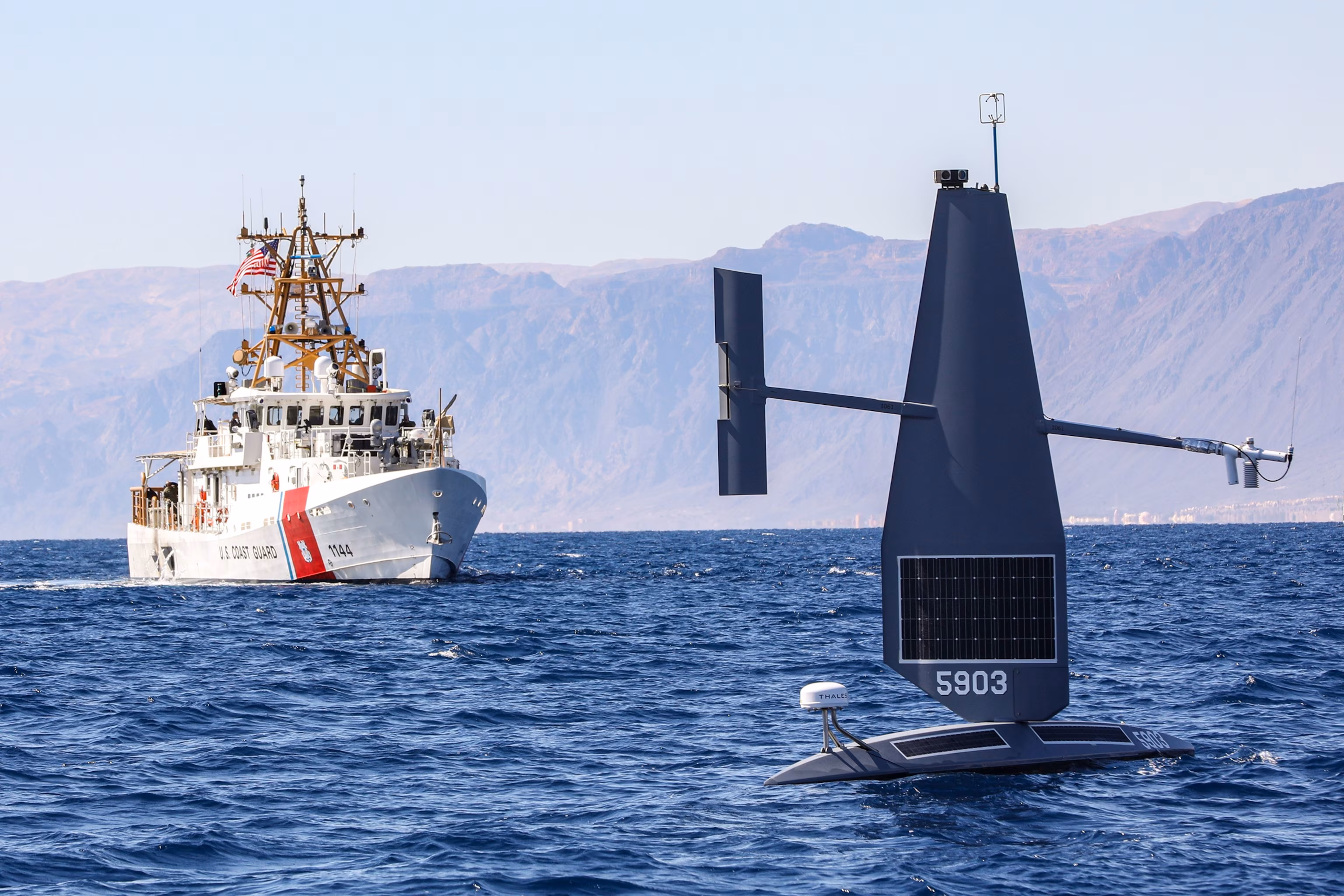 Robotic naval vessel saves two American sailors after aircraft downed by Iran's unmanned aerial vehicle. 8 Robotic naval vessel saves two American sailors after aircraft downed by Iran's unmanned aerial vehicle. 8