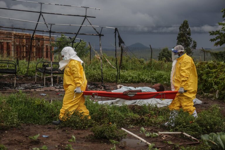 The Ebola doctor on the front lines of the outbreak faces a daily dilemma: Should I hug my children? 5