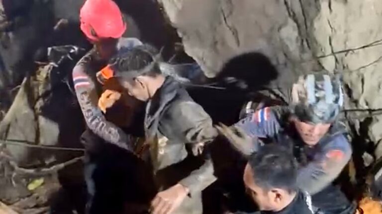 Rescuers halt efforts for two miners presumed stuck in a waterlogged Laos cave 14